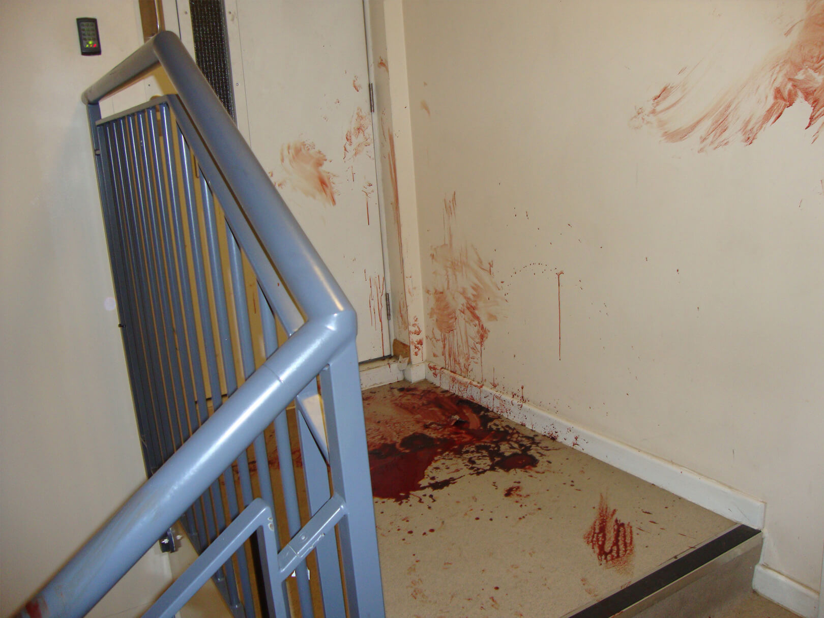 Trauma scene in hallway of flat