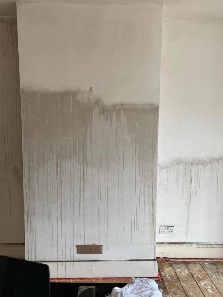 fire damage cleaning soot wall