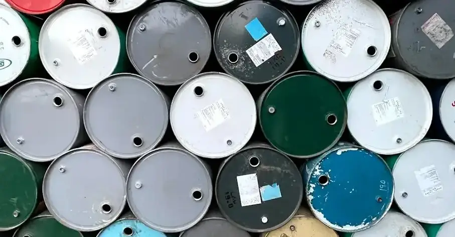 Multiple oil storage drums from above.