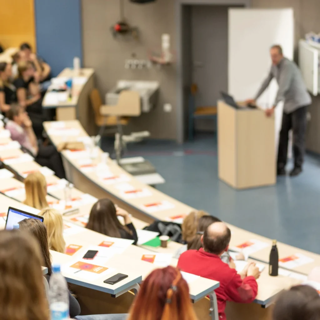 University lecture hall full of students.