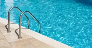 Swimming pool with ripples on the surface of the water.
