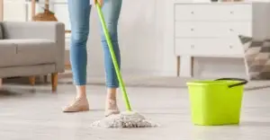 Female mopping a floor