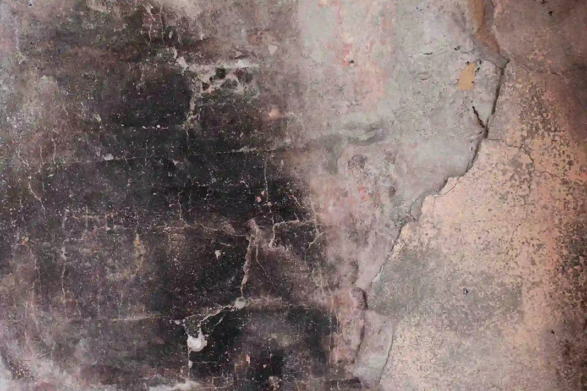 Soot and ash on wall