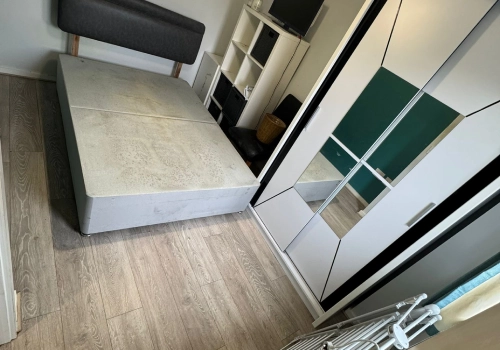 Hoarded bedroom in the UK after work finished