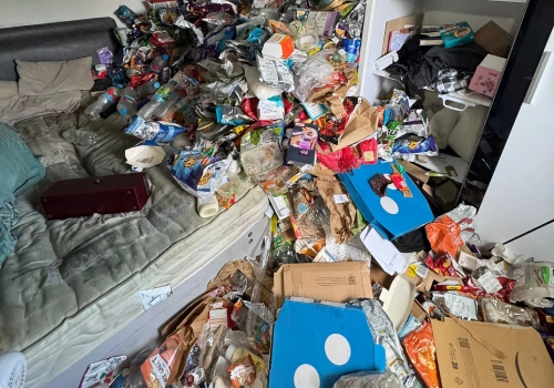 Hoarded bedroom in the UK before work started