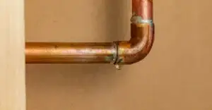 Leaking copper water pipe.