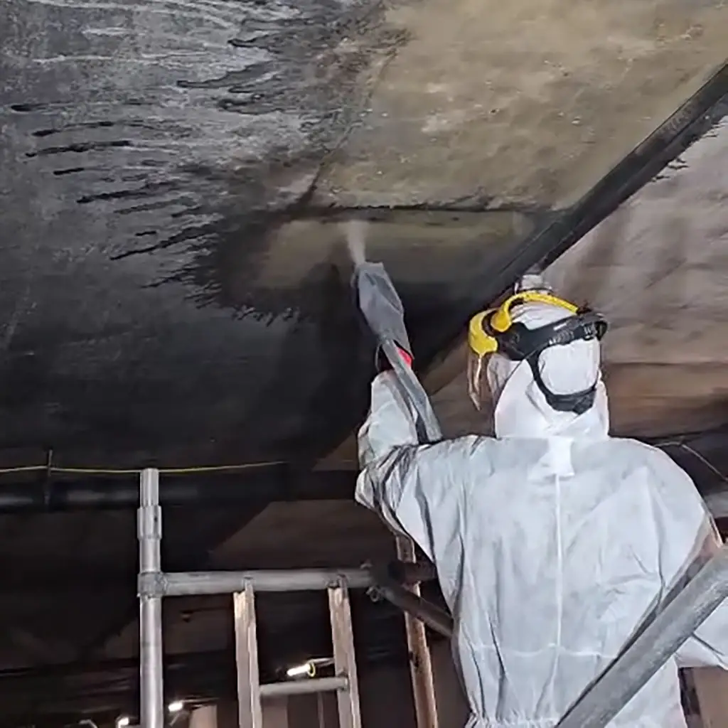 Sandblasting soot and ash damage.