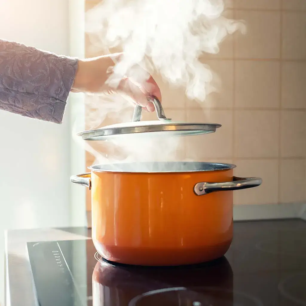 Steam from a cooking pot.