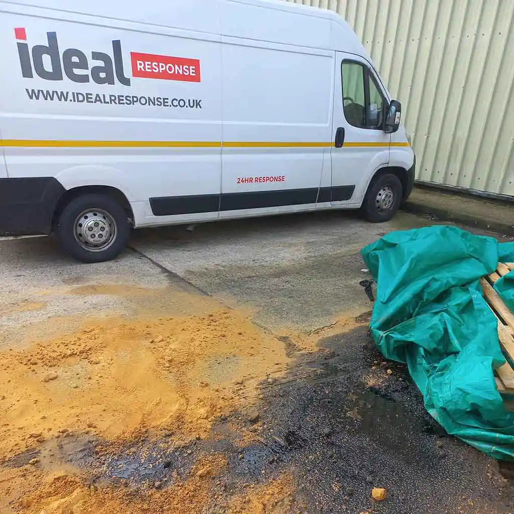 Oil spill contained with sand.