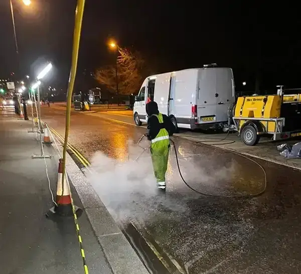 Ideal Response technician cleaning oil spill