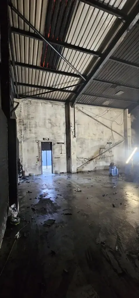 Washdown of fire damage.
